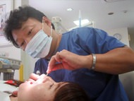歯科医師のチェックの写真